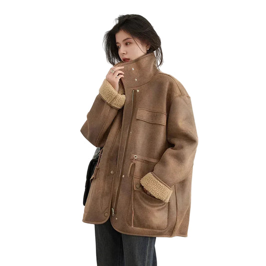 Person wearing a brown coat with fur-lined cuffs and collar, standing against a white background with 'CHIC VEN' branding.