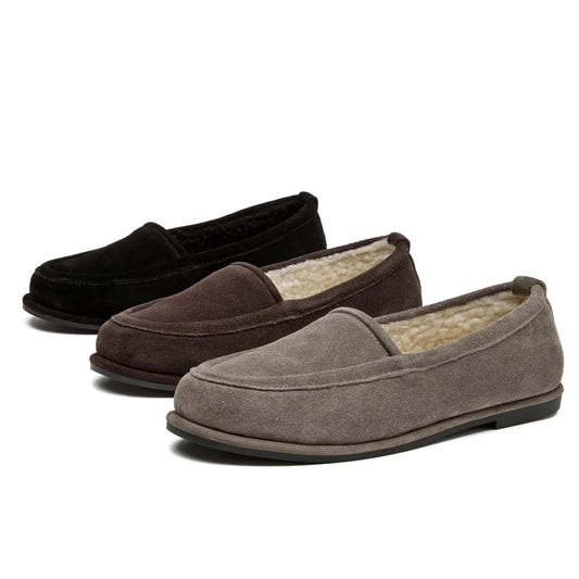 Three pairs of slippers in black, brown, and gray on a white background