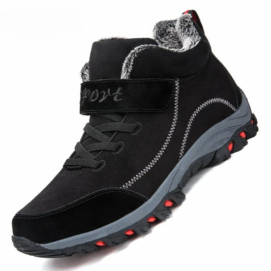 Black winter boot with gray fur lining and red accents on a white background