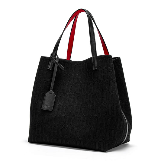 Black textured tote bag with red interior accents on a white background