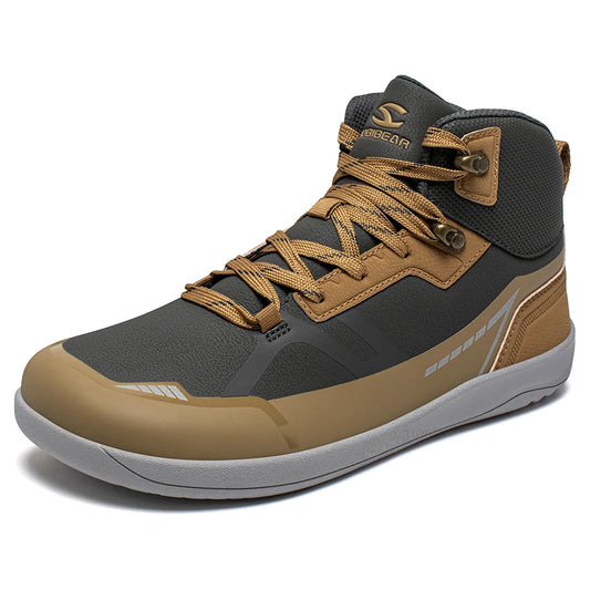 A high-top outdoor boot from Scorpion, featuring a dark gray and tan color scheme with matching laces, a tan rubber toe cap, and a light gray outsole, shown on a clean white background.