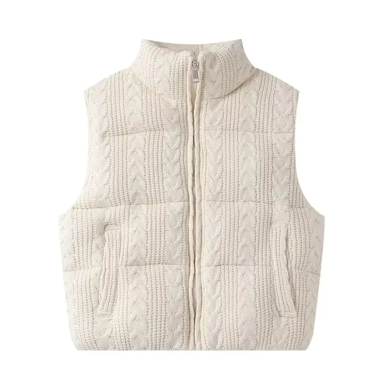 Beige quilted vest on a white background