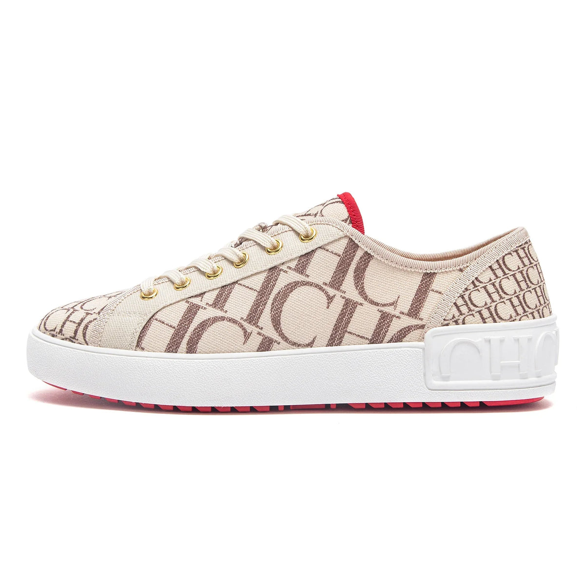 Beige sneaker with brown logo pattern on a white background