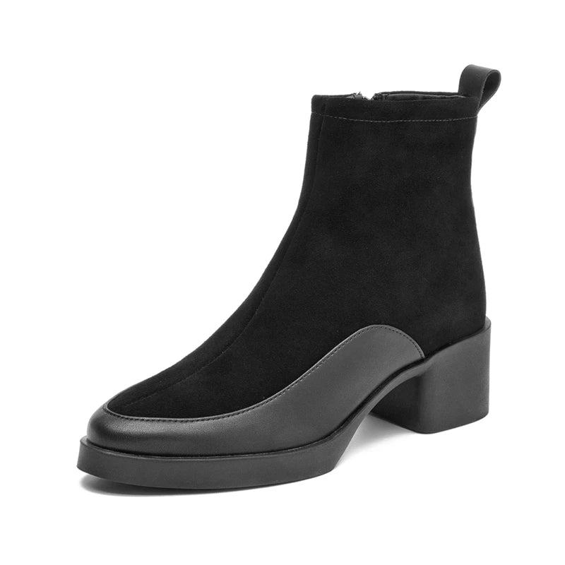 Black ankle boot on a white background