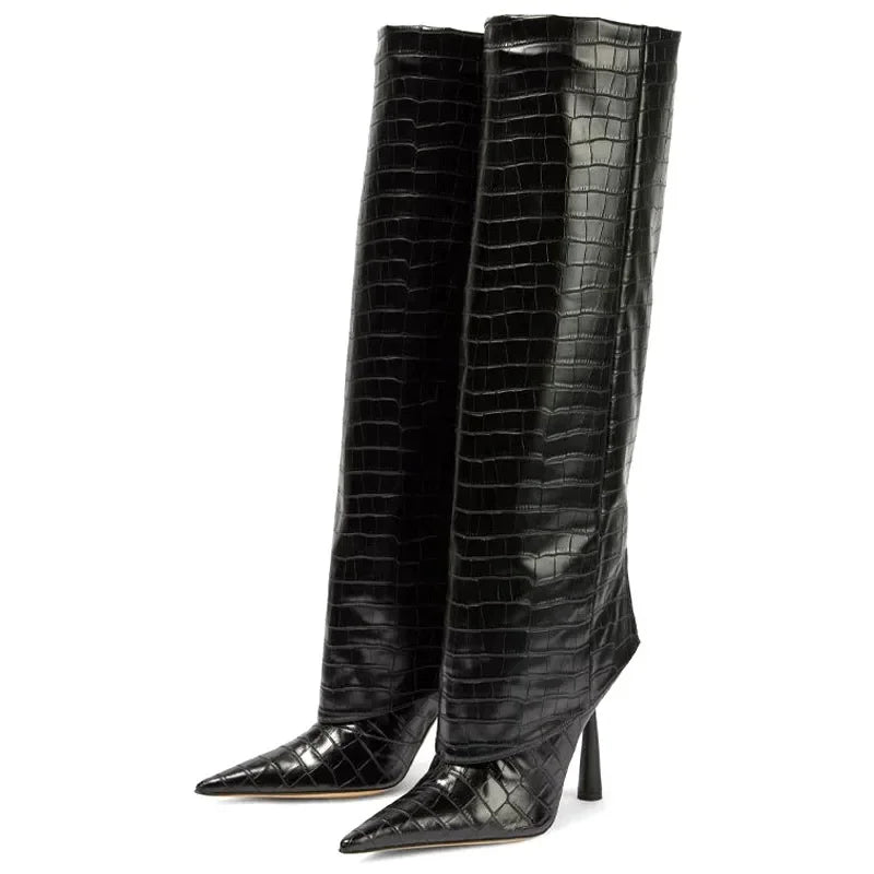 Black crocodile-patterned knee-high boots on a white background