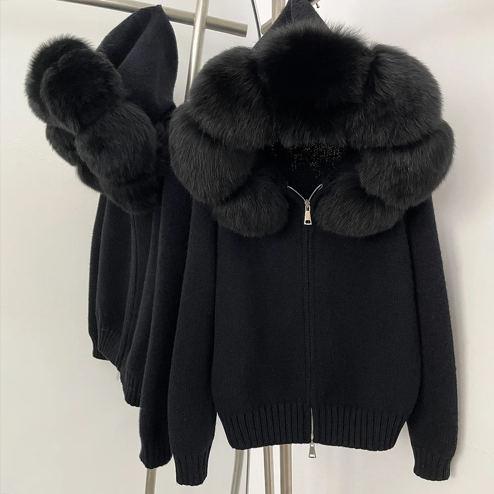 Black jacket with large fur collar on a white background