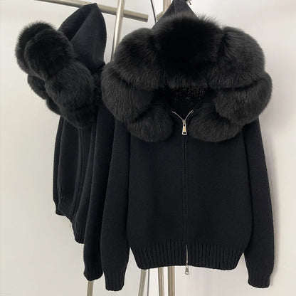 Black jacket with large fur collar on a white background