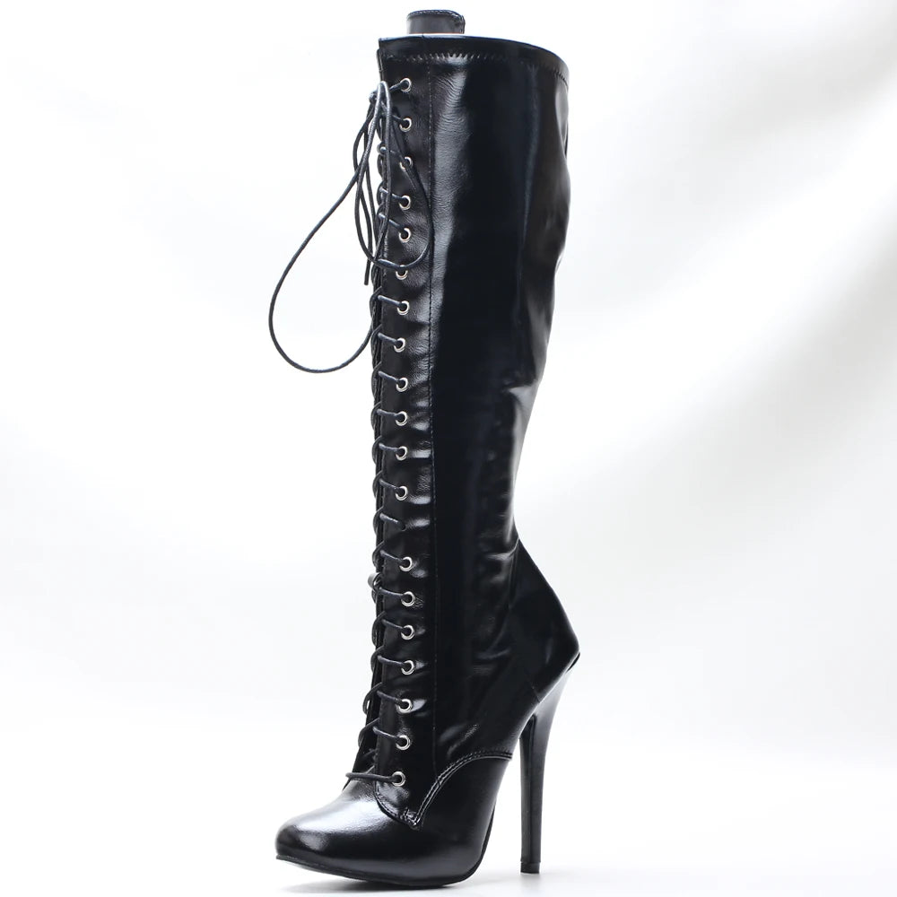 Black knee-high boot with high heel on a white background