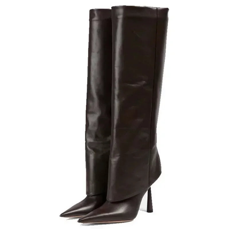 Black knee-high boot with studded details and a zipper on a white background