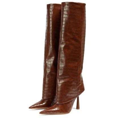 Brown knee-high boots with crocodile texture on a white background