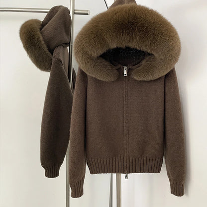 Brown sweater with fur hood on a white background