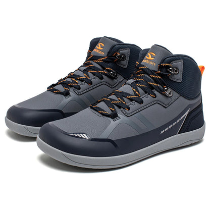 Gray high-top sneakers with orange accents on a white background