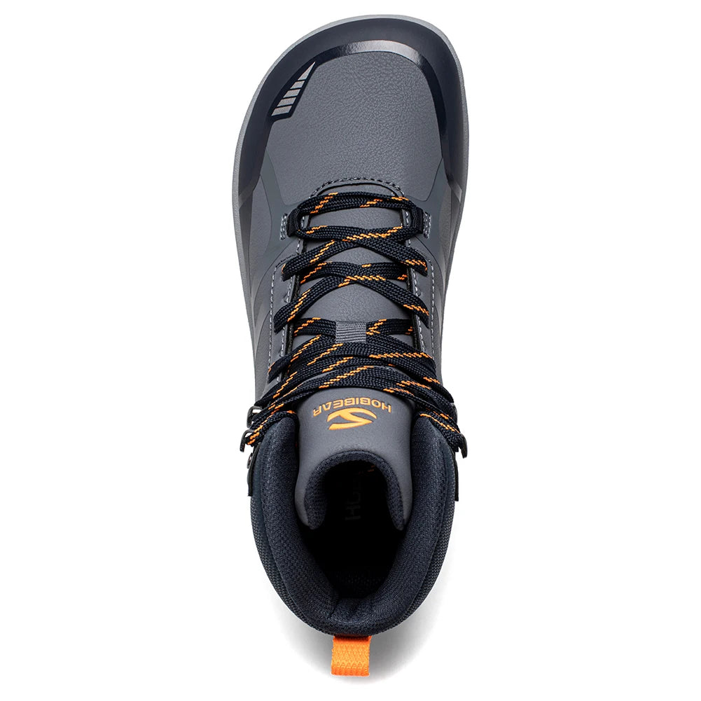 Gray hiking boot with orange accents on a white background