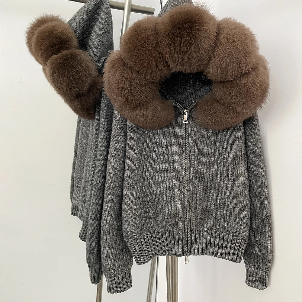 Gray sweater with brown fur trim on a white background