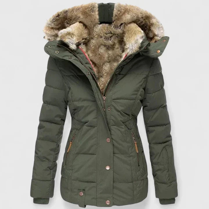 Green winter jacket with fur-lined hood on a light gray background
