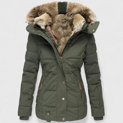 Green winter jacket with fur-lined hood on a light gray background