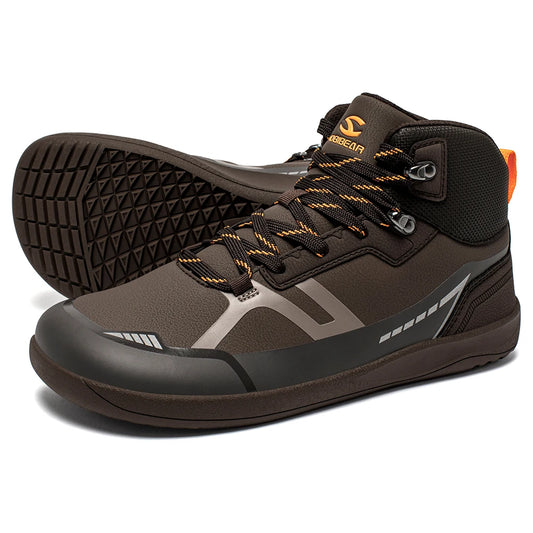 Pair of brown and black high-top sneakers with orange accents on a white background