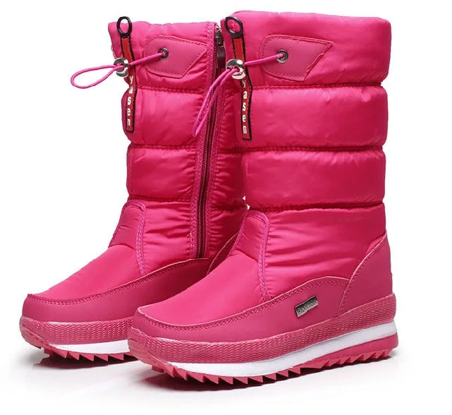 Pair of pink winter boots on a white background