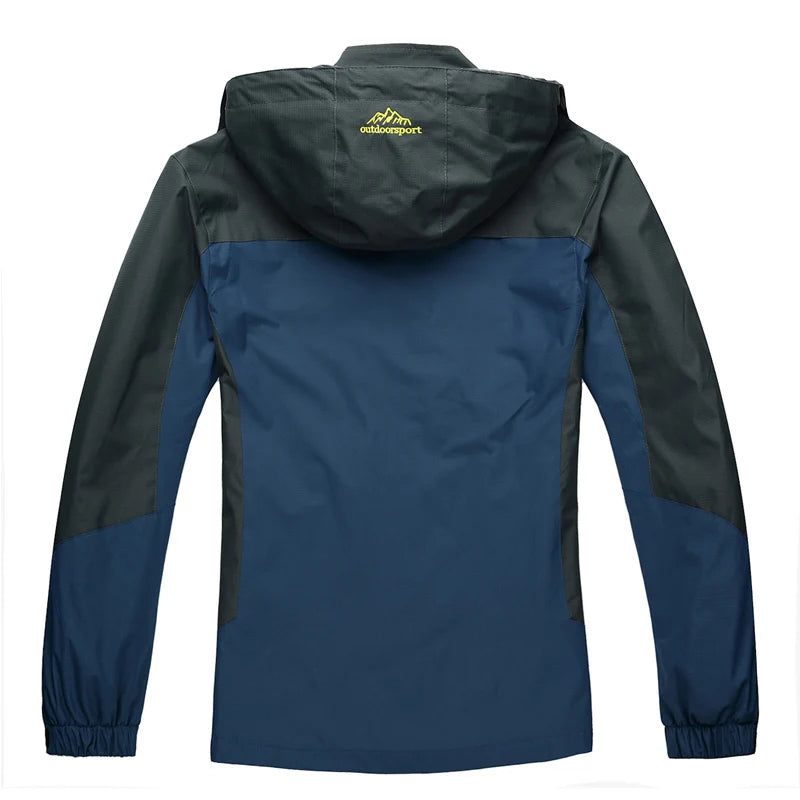 Back view of a blue and green jacket with a brand logo on a white background