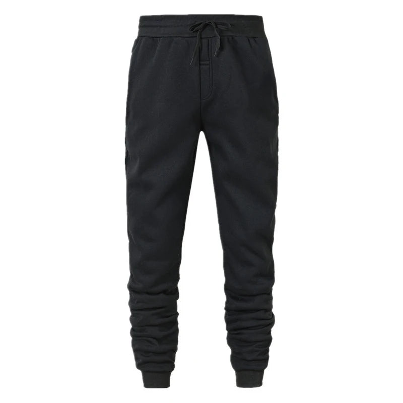 Black jogger pants on a white background
