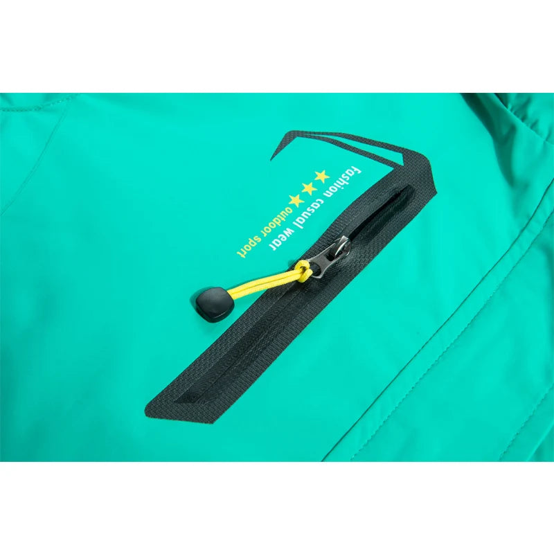 Close-up of a teal jacket with a black zipper and yellow pull tab on a white background