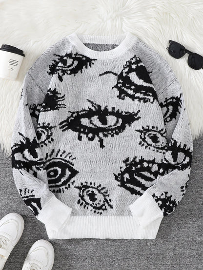 Sweater with eye pattern on a white surface