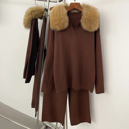 Brown outfit with fur-lined hood on a rack against a white background