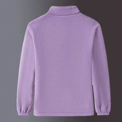 Purple fleece jacket on a gray background