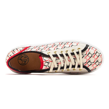 Sneaker with a patterned design on a white background
