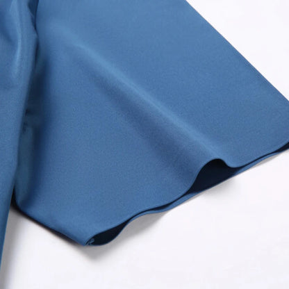 Close-up of blue fabric on a white background
