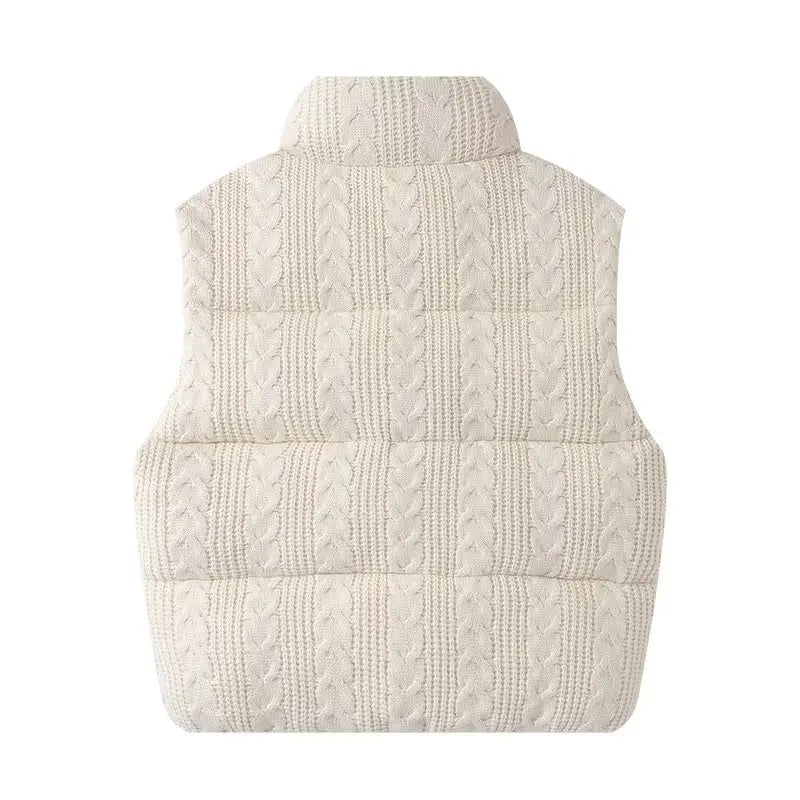White knitted vest on a white background
