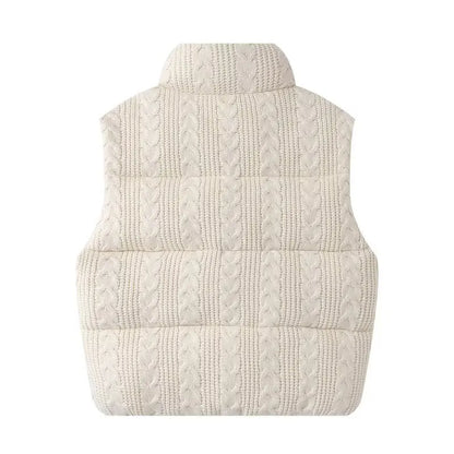 White knitted vest on a white background