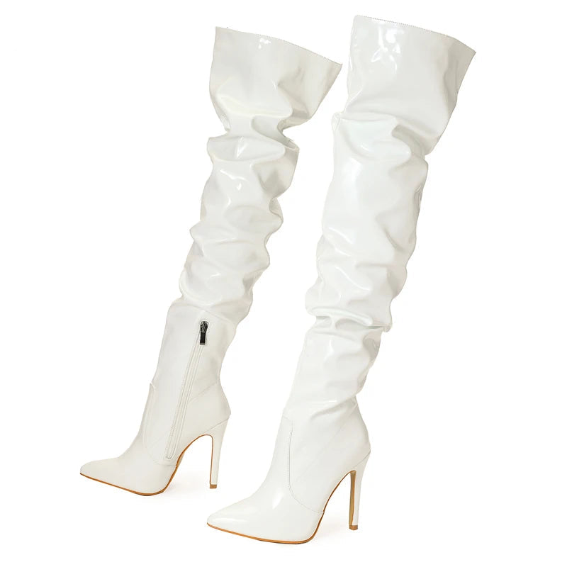White over-the-knee boots with high heels on a white background, branded 'Eilyken'.
