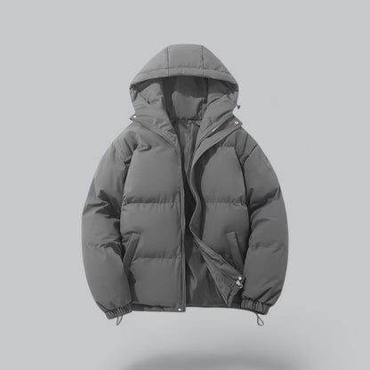 Gray puffer jacket on a light gray background