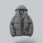 Gray puffer jacket on a light gray background
