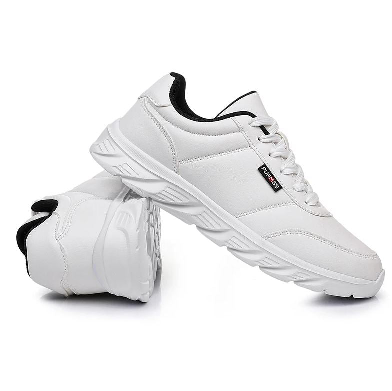 White sneakers with black accents on a white background