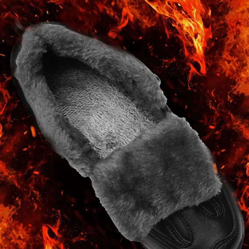 Gray fluffy glove against a fiery background