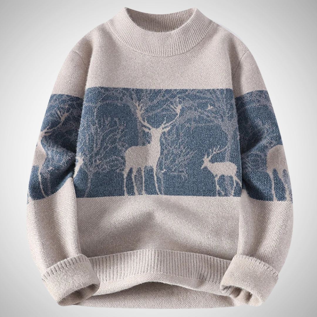 Beige sweater with deer pattern on a light gray background