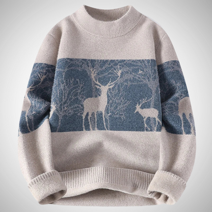 Beige sweater with deer pattern on a light gray background