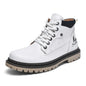 White boot with black sole on a white background