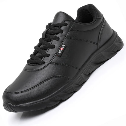 Black sneaker with visible brand logo on a white background