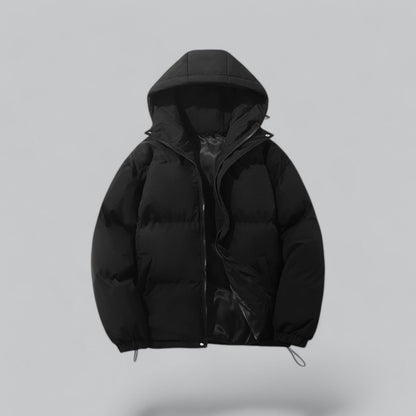 Black puffer jacket with a hood on a light gray background