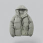 Light gray puffer jacket with a hood on a light gray background