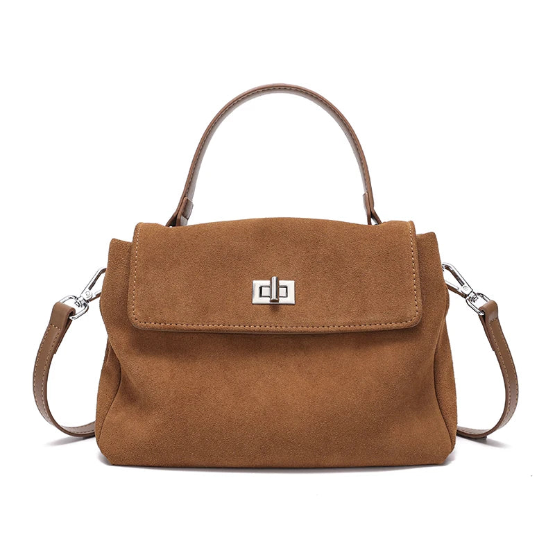 Brown handbag with a visible brand logo on a white background