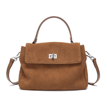 Brown handbag with a visible brand logo on a white background