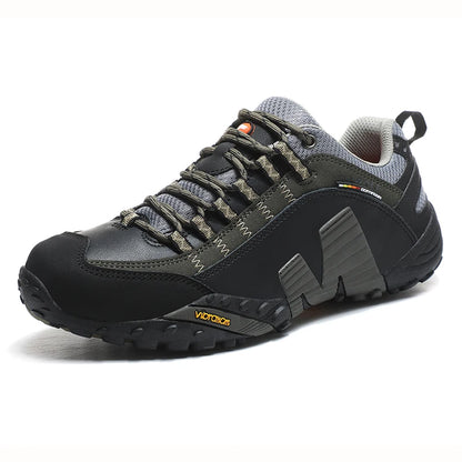 Black and gray hiking shoe with visible brand logo on a white background