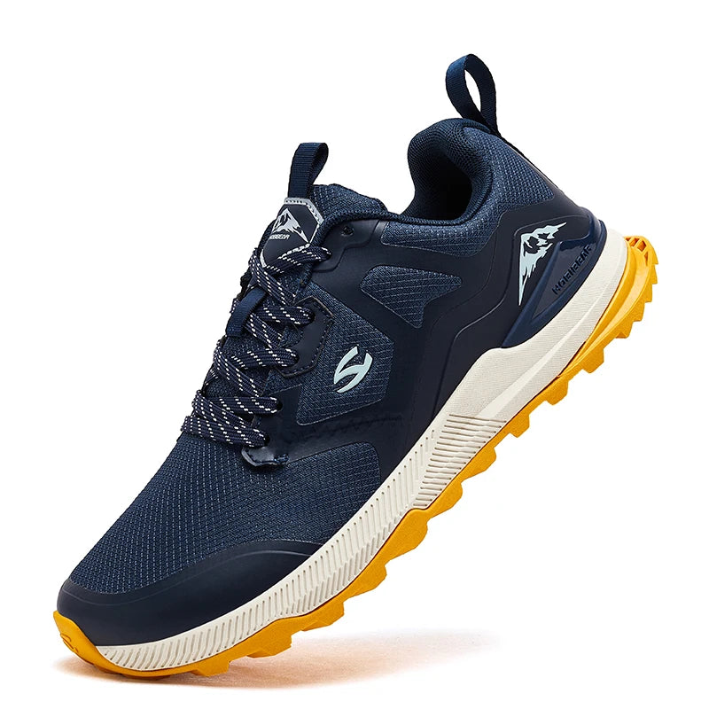 Navy running shoe with yellow sole on a white background