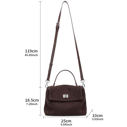 Brown handbag with measurements on a white background