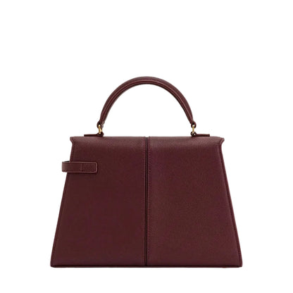 Brown handbag with a handle on a white background