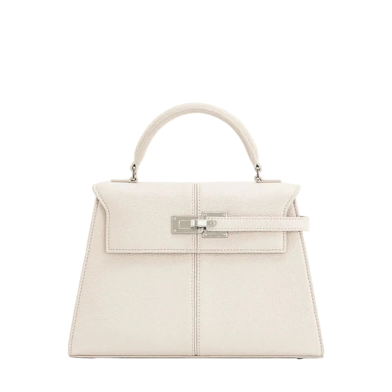 White handbag with a silver clasp on a white background